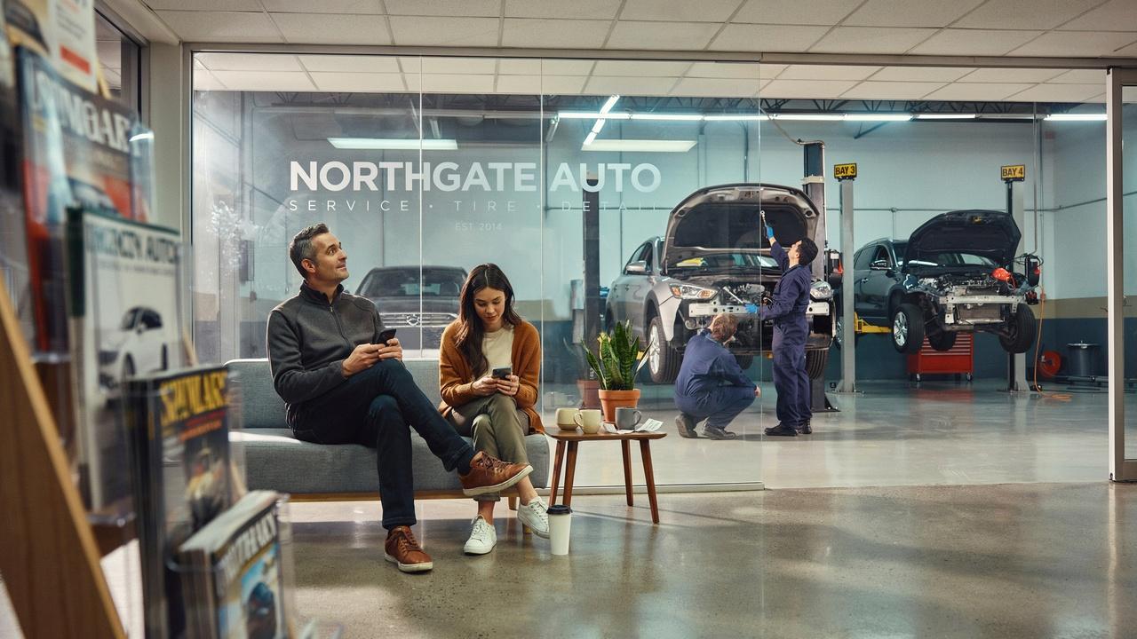 Customer waiting while a tire is being changed at an auto center.