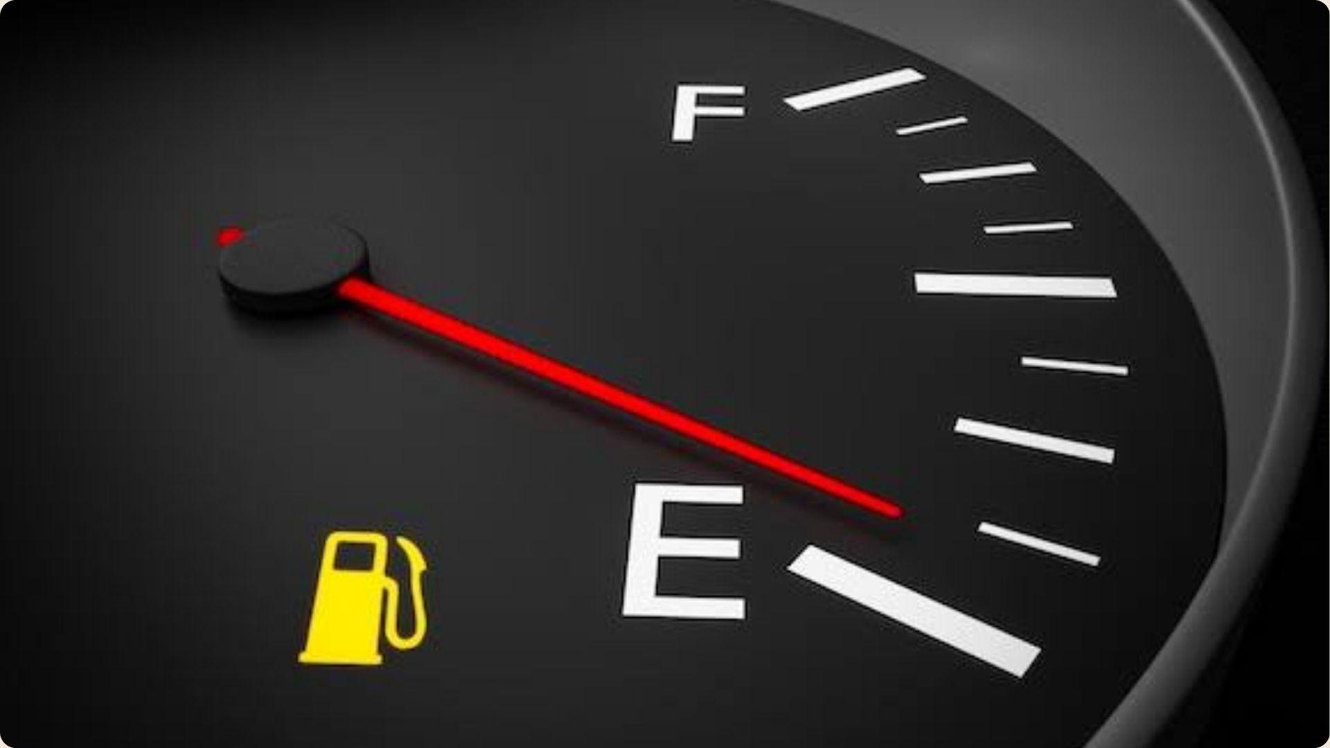Fuel gauge indicating empty, marked with the letter "E" to signify low fuel level.