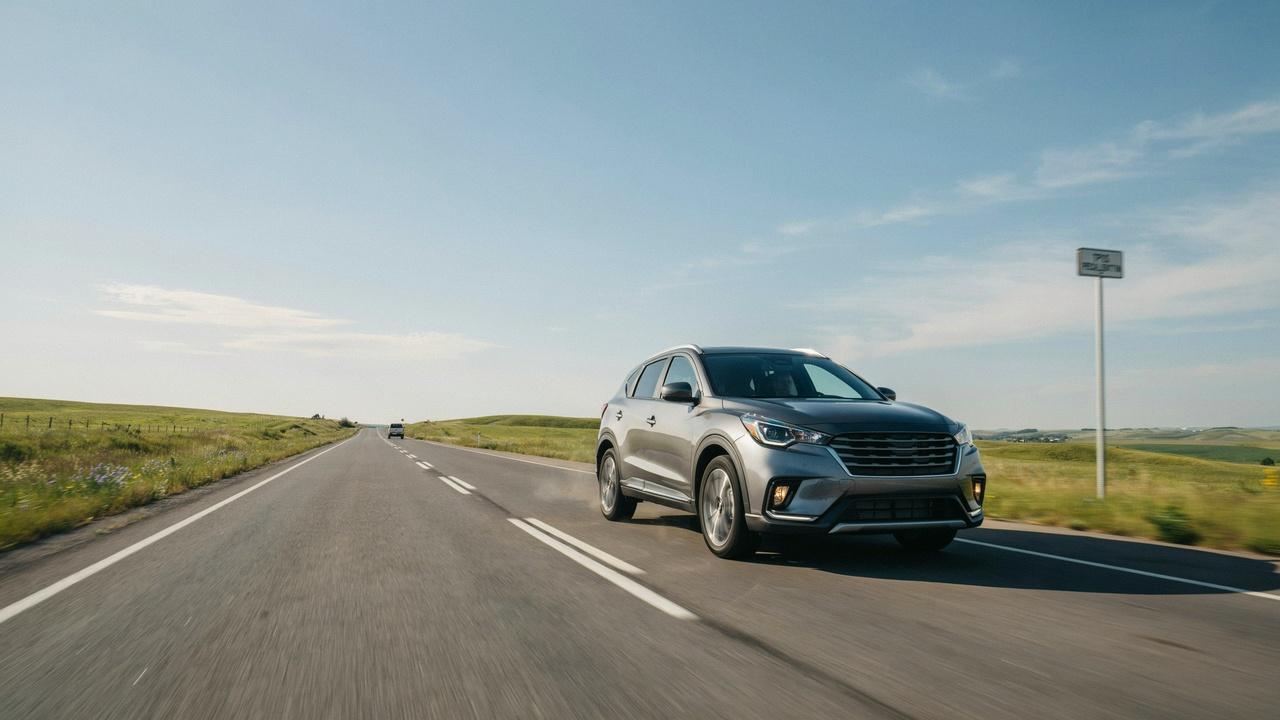 Vehicle being driven to allow tire sensors to recalibrate.