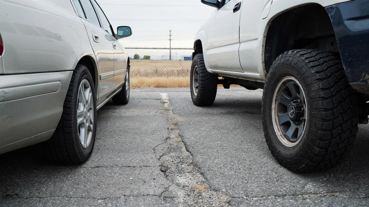 Passenger car, SUV, and truck showing different tire rotation needs.